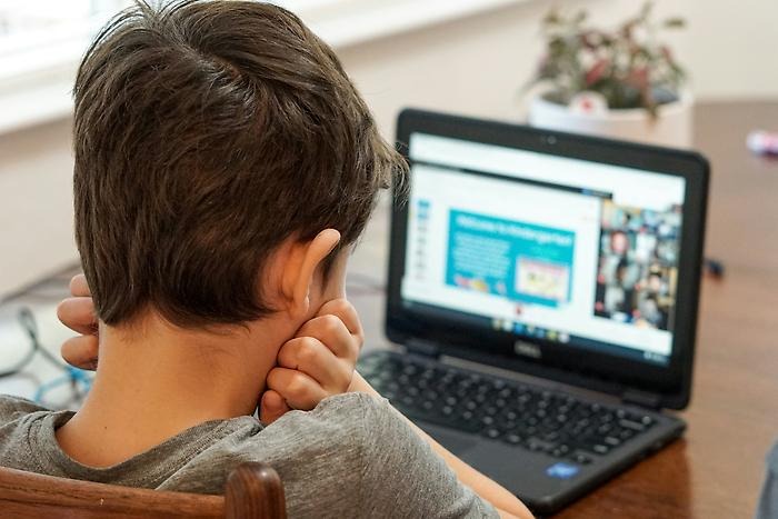 A child at a computer